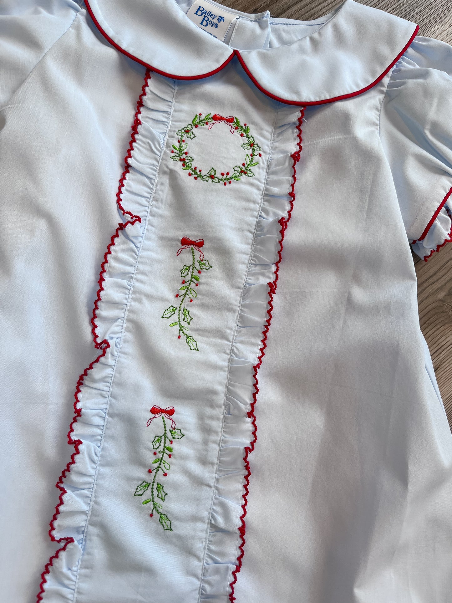 EMBROIDERED WREATH WITH BLUE DRESS